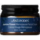 A jar of Antipodes Jasmine Flower Menopause Facial Cream with a black ribbed lid, dark amber glass jar, and a navy blue label with white text.