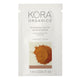 Kora Organics Turmeric Glow Moisturizer sample packet on a white background