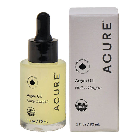 Acure Argan Oil bottle and packaging on a white background
