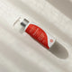 Amazing You Magnesium Joint Lotion bottle with red label on a light background. With camphor, black seed & nettle leaf.