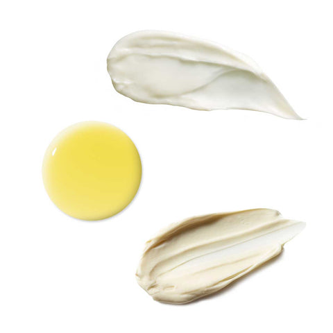 Three different textures of cream or oil on a white background.