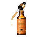 A brown glass bottle with a dropper applicator labeled 'Glow Vitamin C Brightening Serum' from the brand Antipodes.
