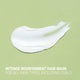 White hair mask on a green background with text about hair mask for all hair types.