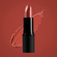 Boom rock bronze lipstick swatch on a background of the same colour.