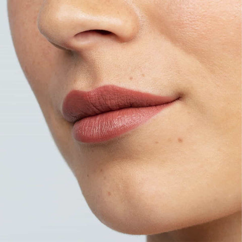 Queenstown hot chocolate lipstick swatch on a person's lips.