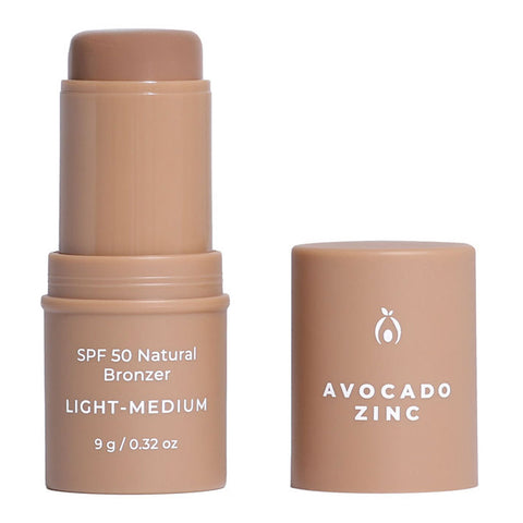 SPF 50 Natural Bronzer stick with 'Avocado Zinc' branding on a white background. Light - Medium shade.