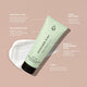 Avocado Zinc sunscreen tube with product features on a beige background.