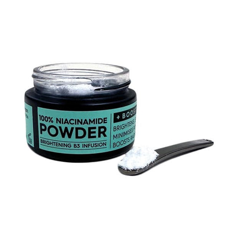 Jar of Black Chicken Remedies 100% Niacinamide Powder 10g with a spoonful of powder.