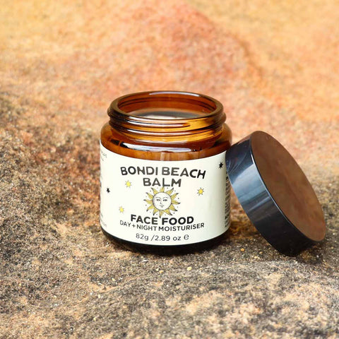 Bondi Beach Balm jar on a textured surface