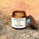 Bondi Beach Balm jar on a textured surface