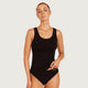 A woman modeling a black scoop-neck tankini top and matching black briefs against a light gray studio background. The brand name 'BOODY' is visible in white text on the waistband of the briefs.