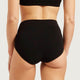 Boody Period & Leak Proof Full Briefs Light-Moderate Black lifestyle back view of a person wearing the black full briefs, styled lifestyle photo