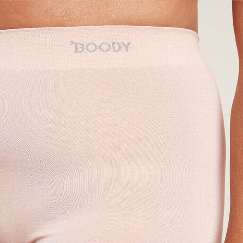 Close-up view of nude smoothing short - bamboo viscose, elastane & nylon fabric. Boody logo on waistband.