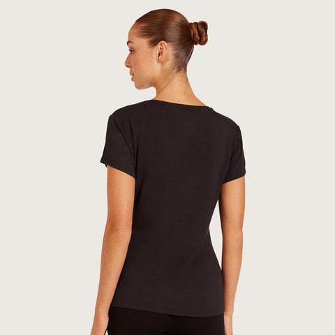 Boody Women's Base Layer V-Neck T-Shirt Black lifestyle back view of a woman with her hair up wearing the black tee, styled lifestyle photo