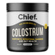 A black and white container of Chief Colostrum powder with yellow accents on the label.