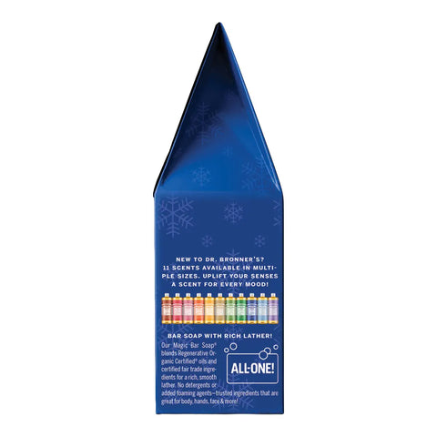 A blue Dr. Bronner's All-One gift box, shown from the back side with product details, a row of colorful soap dropper bottles, and text highlighting 'Bar Soap with Rich Lather!' and 'All-One!'.