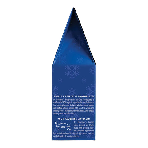 A blue pointed gift set shown from the back side, featuring white text and snowflake graphics on a plain white background.