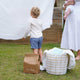 Family outside doing laundry with ease.y earth products.