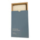 Dishwashing detergent sheets in blue cardboard packaging on a white background.