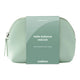A mint green zippered cosmetic pouch with a central paper sleeve label reading 'hello balance mini kit' and the brand 'endota' at the bottom, shown on a plain white background.