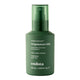 Green bottle of endota magnesium mist on a white background.