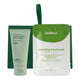 Endota Signature Blend Hand Therapy gift set featuring a green and white hand therapy tube next to a matching green box, alongside a green and white Hydrating Hand Mask pouch.