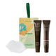 Endota lip duo featuring a cream-coloured box with a green handle, two dark brown lip treatment tubes, and a white silicone lip tool, displayed on a clean white background.