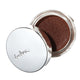 Open jar of Ere Perez Cacoa Bronzing Pot - Costa 7.5g product with silver lid.