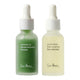 Close up of quandong green booster serum and Australian blue cypress face nectar bottles.