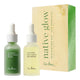 Two skincare serum bottles with their packaging on a white background