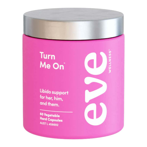 Pink container with silver lid labeled 'Turn Me On' by Eve Wellness on a white background.