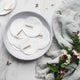 Bowl of ever eco facial pads styled on a bathroom counter.