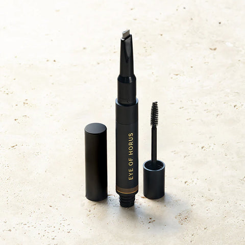 Black mascara with 'Eye of Horus' branding on a light beige background