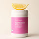 Pink supplement container labeled 'Gut Restore Prebiotic Collagen' 260g from Frank Simple with a lemon wedge on a beige background.