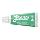 Green mini travel-size tube of Grants Mild Mint Natural Toothpaste.