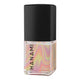 Nail polish bottle with marbled design and black cap on a white background