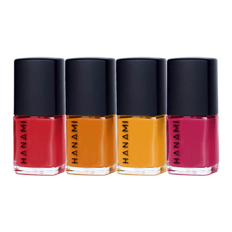 Four bottles of Hanami nail polish in red, pink, orange and yellow shades. On a white background. 