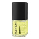 Yellowish rescue me oil nail treatment in a polish bottle with black cap on a white background