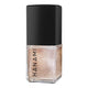 Hanami nail polish bottle with black cap and shimmery gold colour on a white background