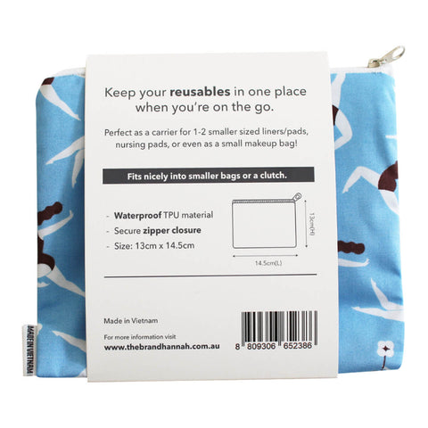 Back view of hannah Waterproof Mini Wet Bag, ideal for carrying 1-2 smaller liners or pads. Approx. 13cm x 14.5cm. Features a waterproof lining with a zipper closure, making it the perfect travel size. Light blue coloured bag. The back shows the label with product features and dimensions.