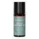 Honest Skincare Organic Castor Oil Rose Quartz Roller 50ml in a dark glass bottle with a black cap and a green label, front view on white
