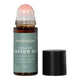 Honest Skincare Organic Castor Oil Rose Quartz Roller 50ml open bottle with the pink rose quartz roller ball and its black cap beside it on white