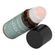 Honest Skincare Organic Castor Oil Rose Quartz Roller 50ml bottle lying on its side with the rose quartz roller ball and black cap beside it on white
