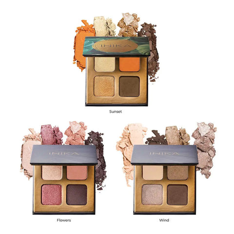 Three INIKA eyeshadow palettes with different colour schemes on a white background.