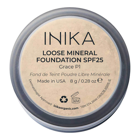 Back of INIKA Organic Loose Mineral Foundation jar on a white background.