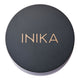 INIKA branding on a black round container lid.