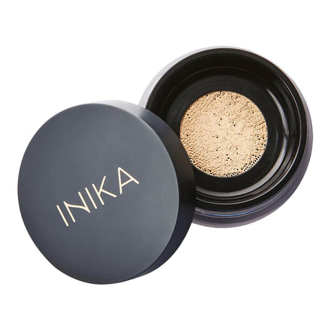 Loose Mineral Foundation in shade Nurture container with black lid on a white background.