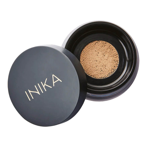 Loose Mineral Foundation in shade Trust container with black lid on a white background.