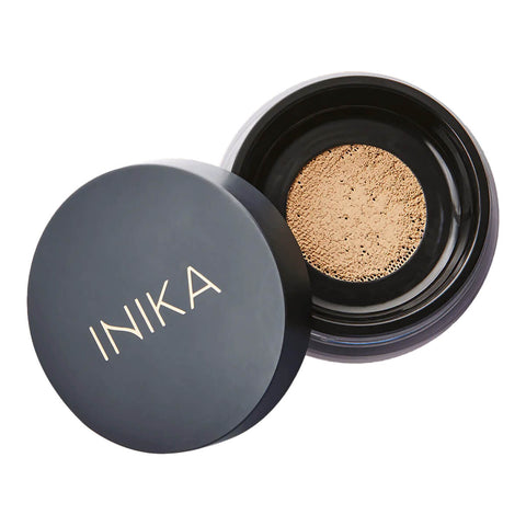 Loose Mineral Foundation in shade Unity container with black lid on a white background.