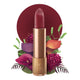 Lipstick detailed with vines & a flower on the tip, set against a floral background.